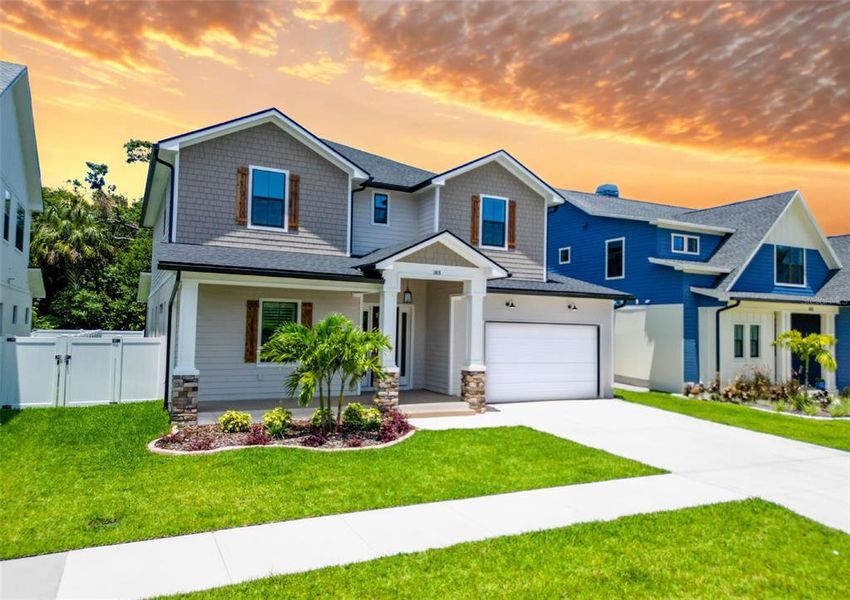 Front exterior of a new home in , Tampa, FL, highlighting curb appeal (Image 25).