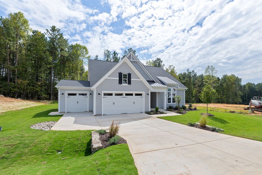 Representative exterior photo of a completed home built from the The Bradley by RobuckHomes in Baylee Ridge, Selma, NC (Image 51). Representative exterior photo of a completed home built from the The Bradley by RobuckHomes in Baylee Ridge, Selma, NC (Image 51).