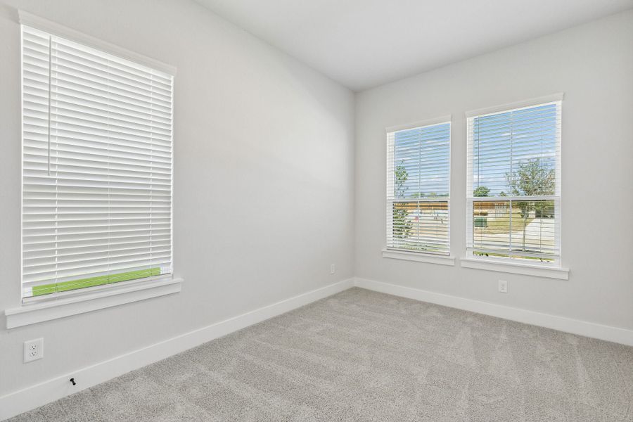 Spacious, unfurnished interior of a new home in Rainwater Crossing, Celina (Image 22).