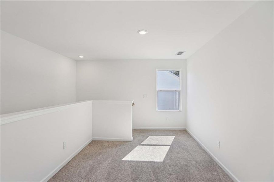 Spacious, unfurnished interior of a new home in The Pointe at Heron Bay, Locust Grove (Image 17).