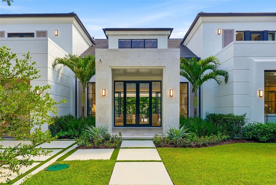 Exterior details and patio area of a home in , Coral Gables (Image 35).
