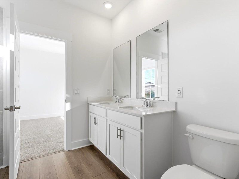 Furnished interior view inside a new home in The Coves at Lakes of Cane Bay, Summerville (Image 37). Furnished interior view inside a new home in The Coves at Lakes of Cane Bay, Summerville (Image 37).