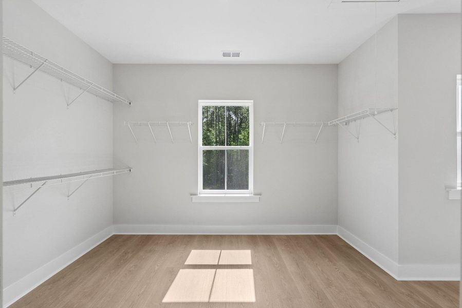 Spacious, unfurnished interior of a new home in Hidden Ponds Reserve, Awendaw (Image 18).