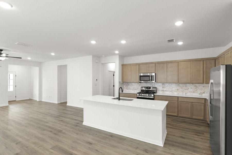 Furnished interior view inside a new home in Village at Three Oaks, Seguin (Image 7). Furnished interior view inside a new home in Village at Three Oaks, Seguin (Image 7).