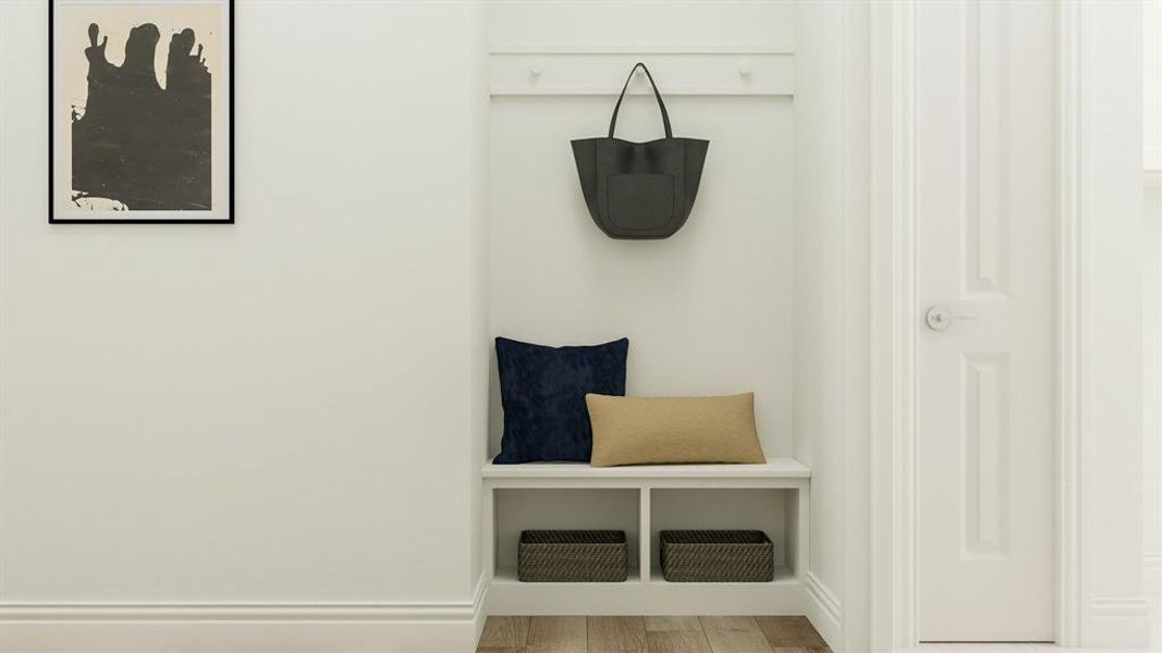 Mudroom with hardwood / wood-style flooring