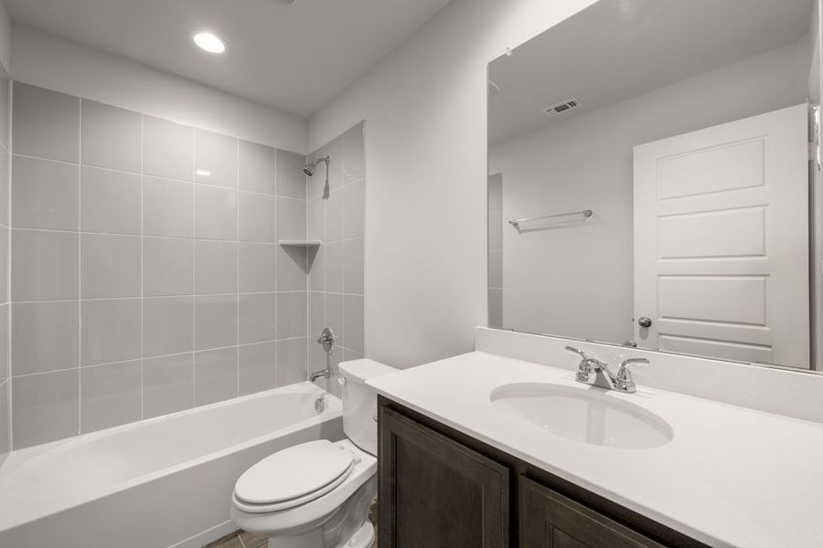 Representative exterior photo of a completed home built from the Brownwood by Impression Homes in Main Street Village, Mansfield, TX (Image 23). Representative exterior photo of a completed home built from the Brownwood by Impression Homes in Main Street Village, Mansfield, TX (Image 23).