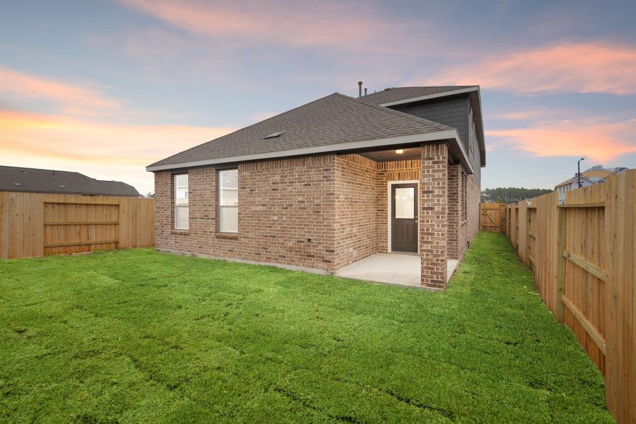 This backyard is perfect for family gatherings, social events, or simply unwinding in the fresh air.