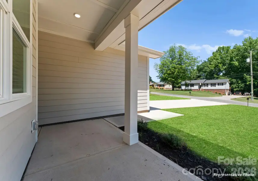 Exterior details and patio area of a home in , Charlotte (Image 24).