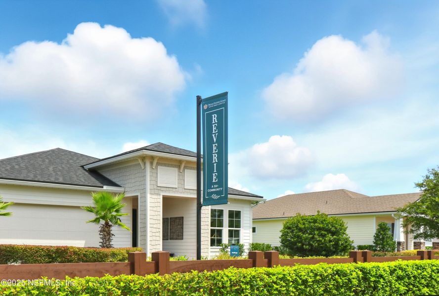Front exterior of a new home in Reverie at TrailMark, St. Augustine, FL, highlighting curb appeal (Image 18). Front exterior of a new home in Reverie at TrailMark, St. Augustine, FL, highlighting curb appeal (Image 18).