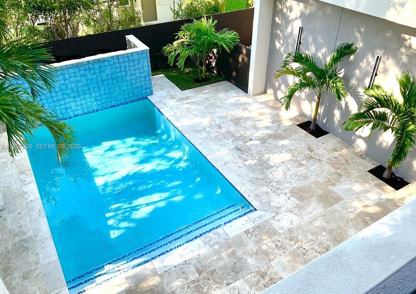 Exterior details and patio area of a home in , Fort Lauderdale (Image 25).