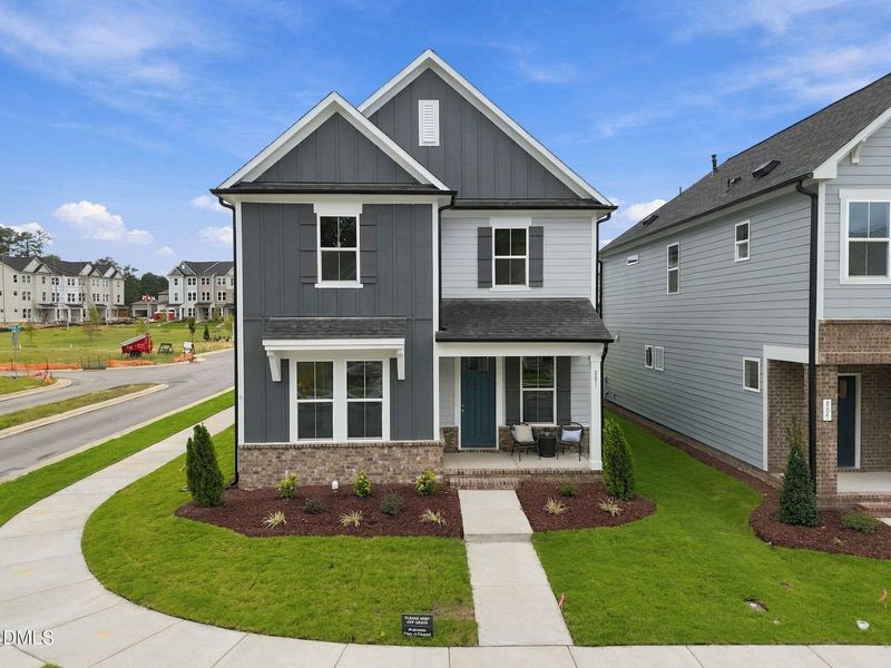 Front exterior of a new home in Forestville Yard, Knightdale, NC, highlighting curb appeal (Image 30). Front exterior of a new home in Forestville Yard, Knightdale, NC, highlighting curb appeal (Image 30).