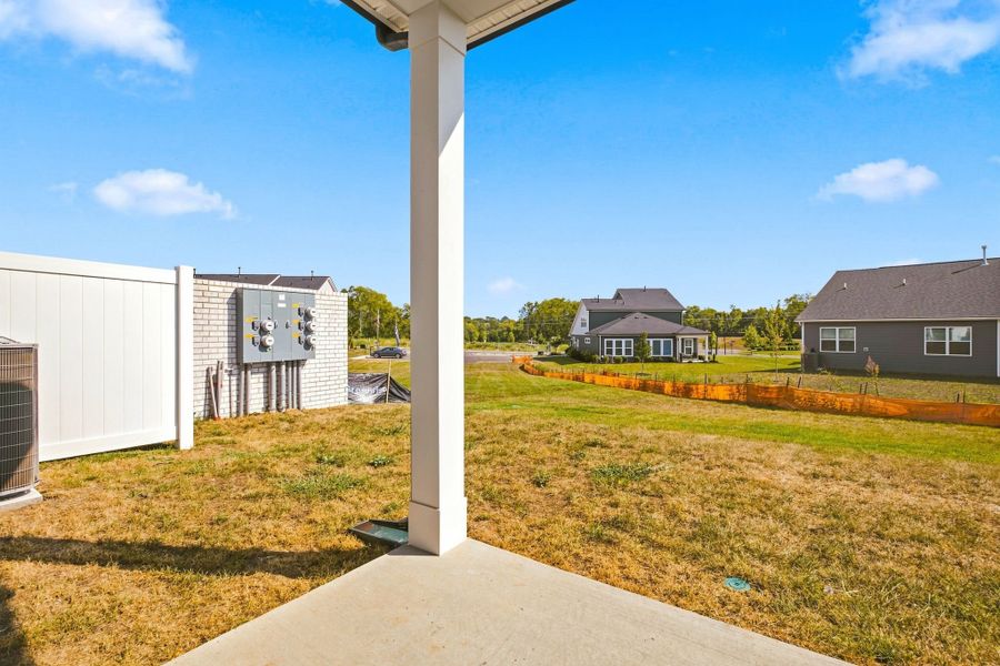 Exterior details and patio area of a home in Nexus Townhomes, Gallatin (Image 3).