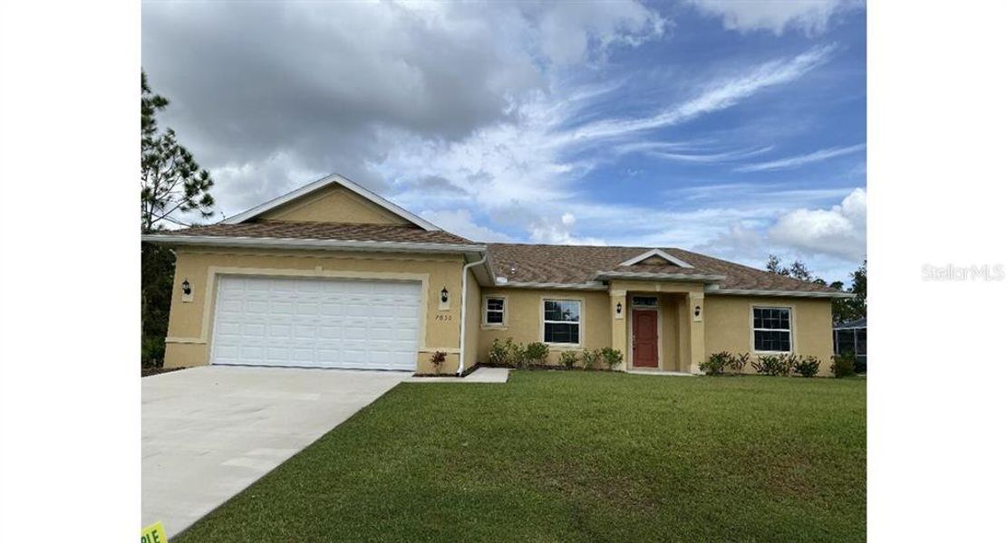 Front exterior of a new home in , North Port, FL, highlighting curb appeal (Image 1). Front exterior of a new home in , North Port, FL, highlighting curb appeal (Image 1).