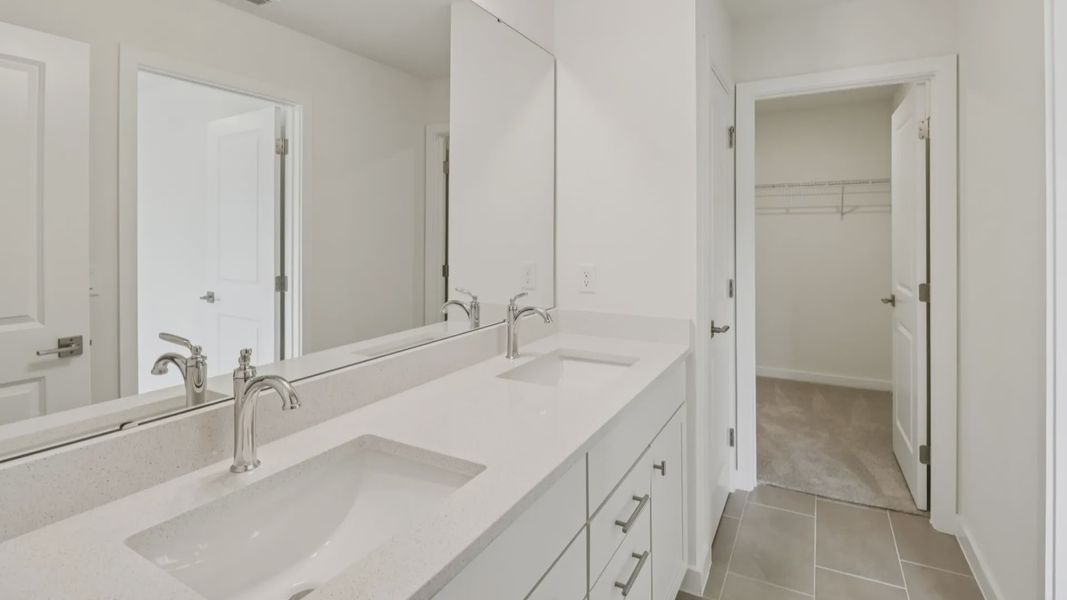 Furnished interior view inside a new home in Cyrene at Harmony, St. Cloud (Image 23).