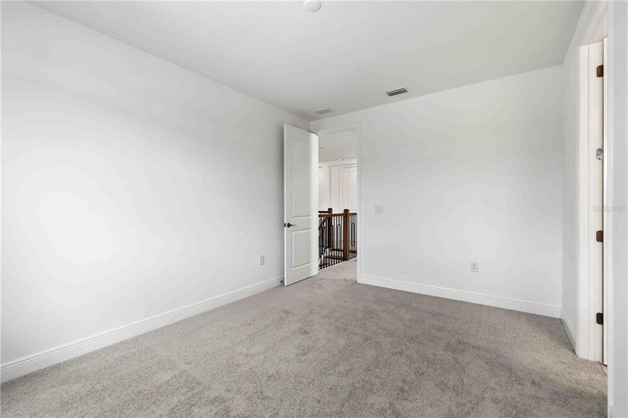 Spacious, unfurnished interior of a new home in Creeks Edge at Twin Rivers, Parrish (Image 45).
