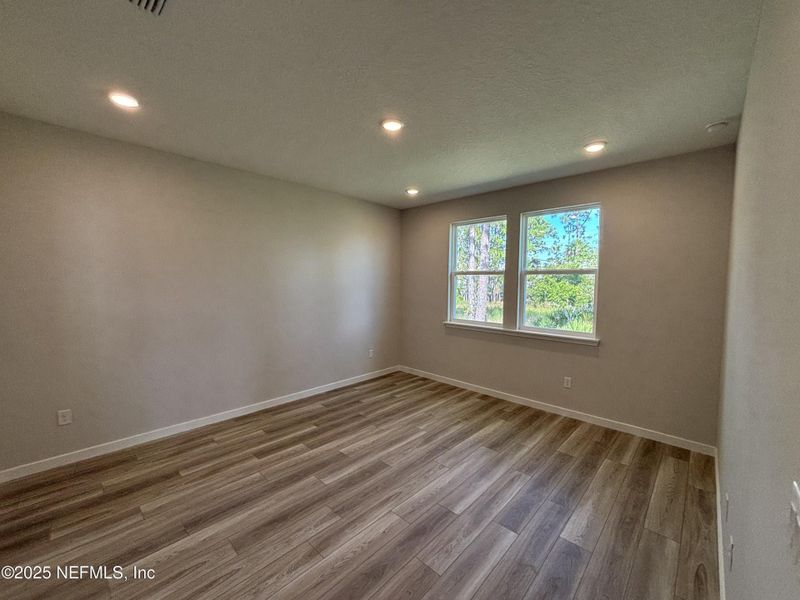 Spacious, unfurnished interior of a new home in The Magnolia Series at Reserve East, Flagler Beach (Image 22).