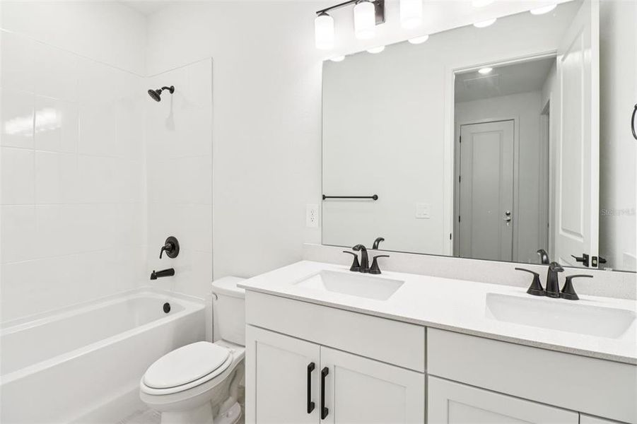 Furnished interior view inside a new home in Ridgehaven - Reserve Series, Ormond Beach (Image 13).