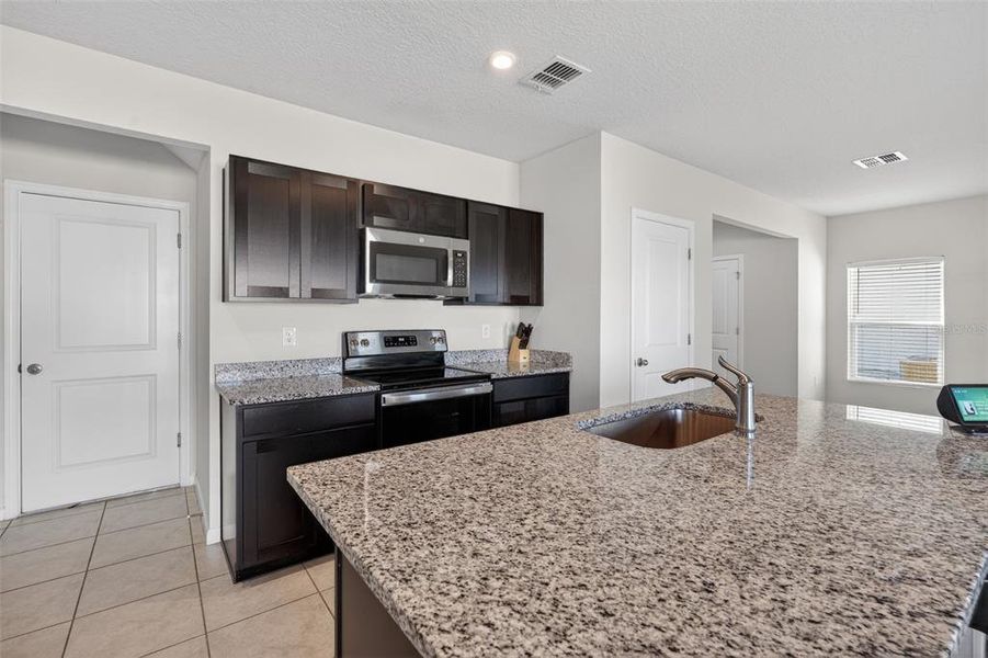 Furnished interior view inside a new home in , Haines City (Image 17).