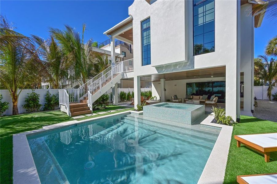 Exterior details and patio area of a home in , Anna Maria (Image 28).