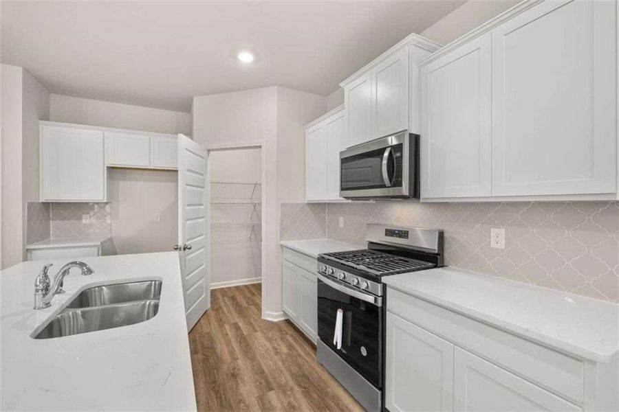 Furnished interior view inside a new home in Poplar Preserve, Newnan (Image 9). Furnished interior view inside a new home in Poplar Preserve, Newnan (Image 9).