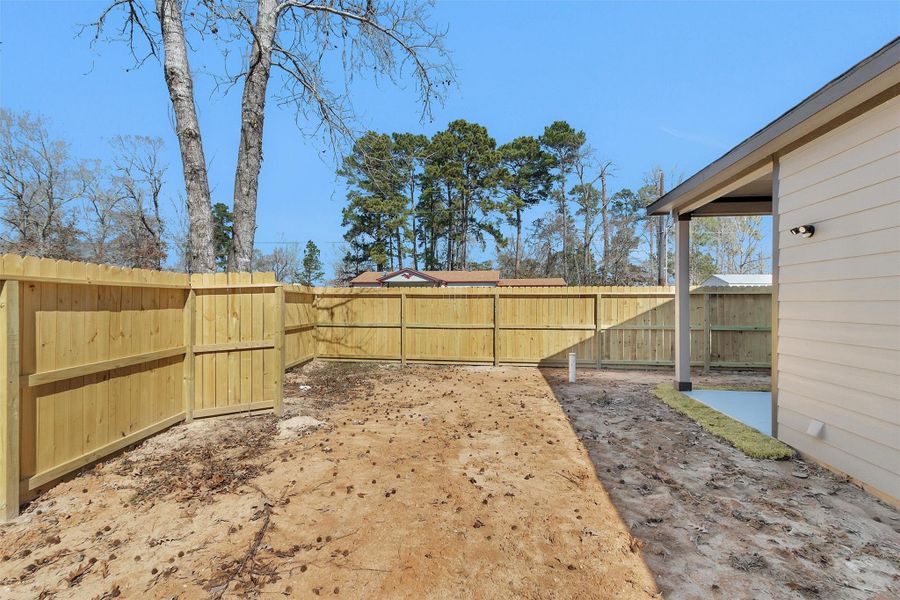 Exterior details and patio area of a home in , Point Blank (Image 25).