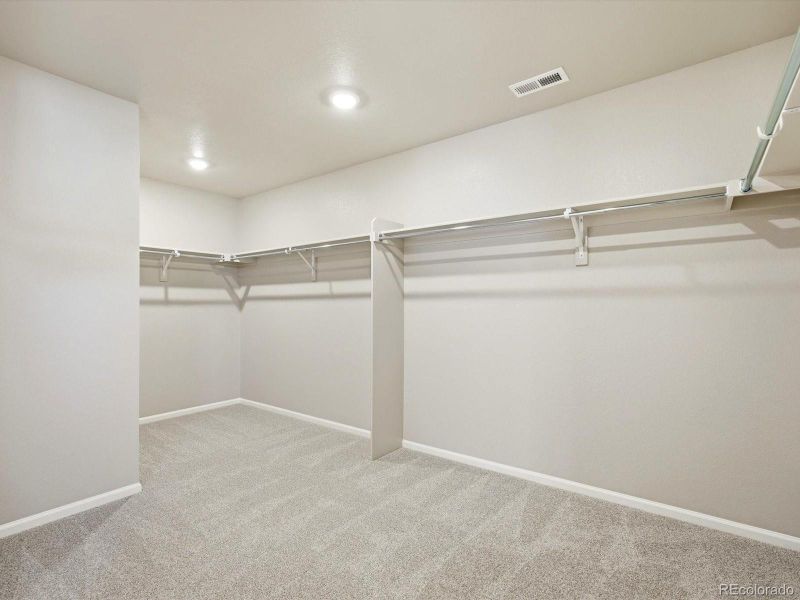 Spacious, unfurnished interior of a new home in Buffalo Highlands: The Flora Collection, Commerce City (Image 23).