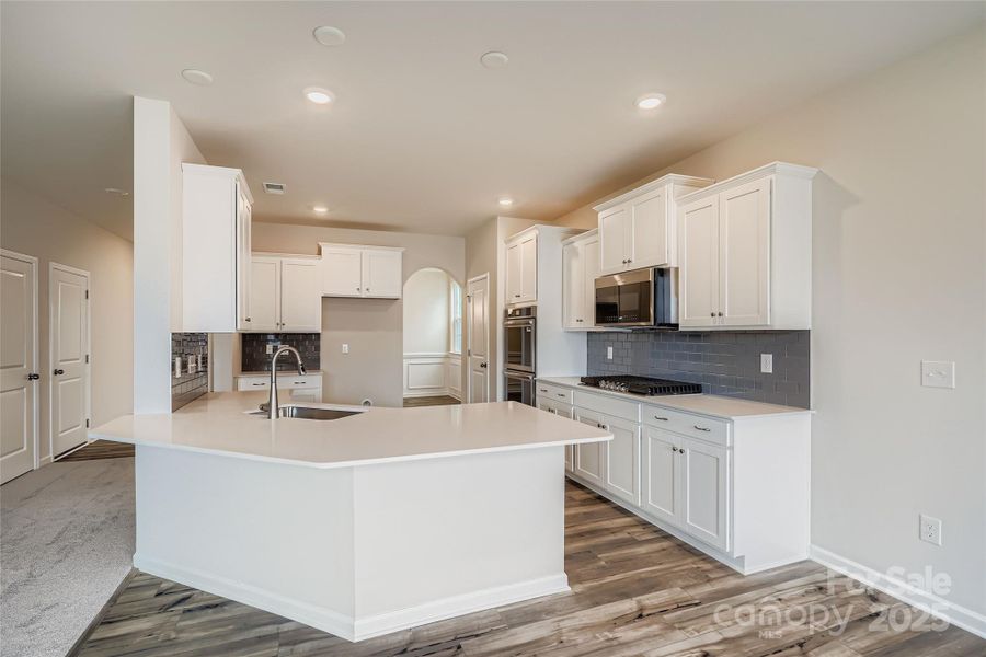 Furnished interior view inside a new home in Shannon Woods: Walk & Enclave, Maiden (Image 6).
