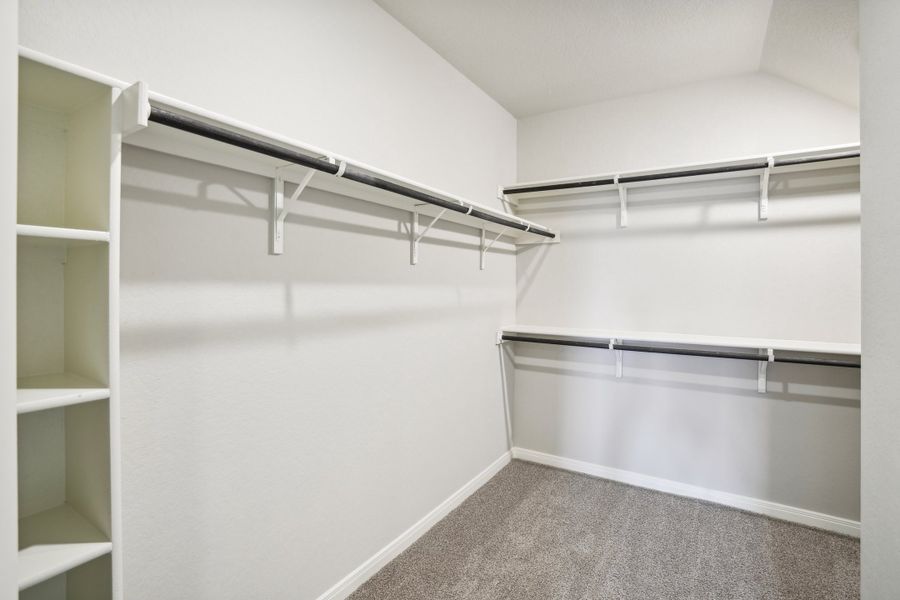 Primary suite walk-in closet of the Reynolds floorplan at a Meritage Homes community.