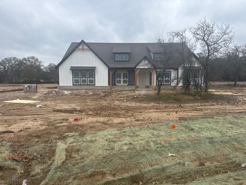 View of front of house featuring covered porch