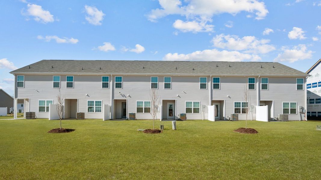 Exterior details and patio area of a home in The Townes at Ridgewood Farms, Winterville (Image 22).