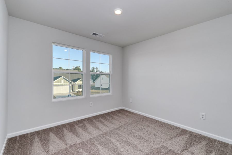 Spacious, unfurnished interior of a new home in Hainer Place, Conway (Image 24).