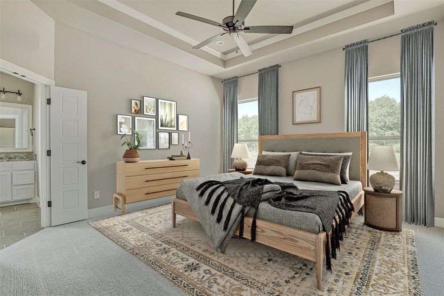 Bedroom with ensuite bathroom, multiple windows, ceiling fan, and light colored carpet