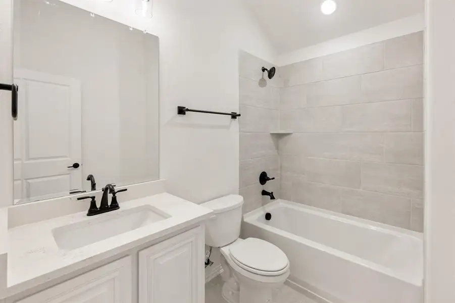 Furnished interior view inside a new home in Villages of Hurricane Creek, Anna (Image 10).