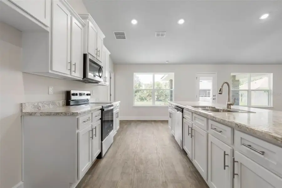 Representative furnished interior of a home built from the 2117 by Adams Homes in Flagler Estates, Hastings (Image 8).