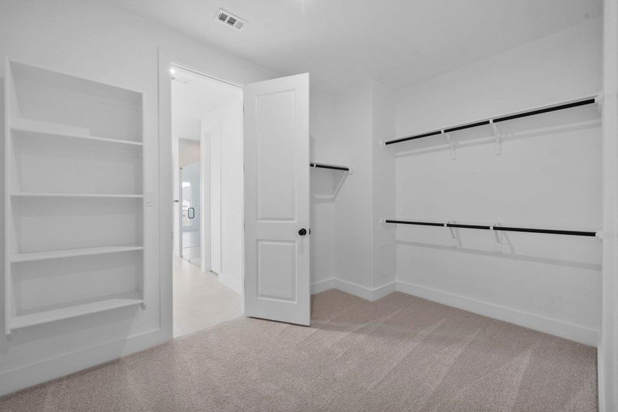 Walk-in closet in Primary Bedroom