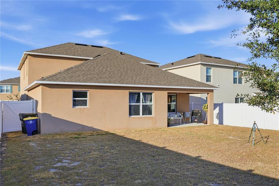 Exterior details and patio area of a home in Wind Meadows South, Bartow (Image 28).