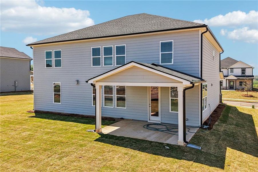 Exterior details and patio area of a home in River Pointe, Monroe (Image 29).