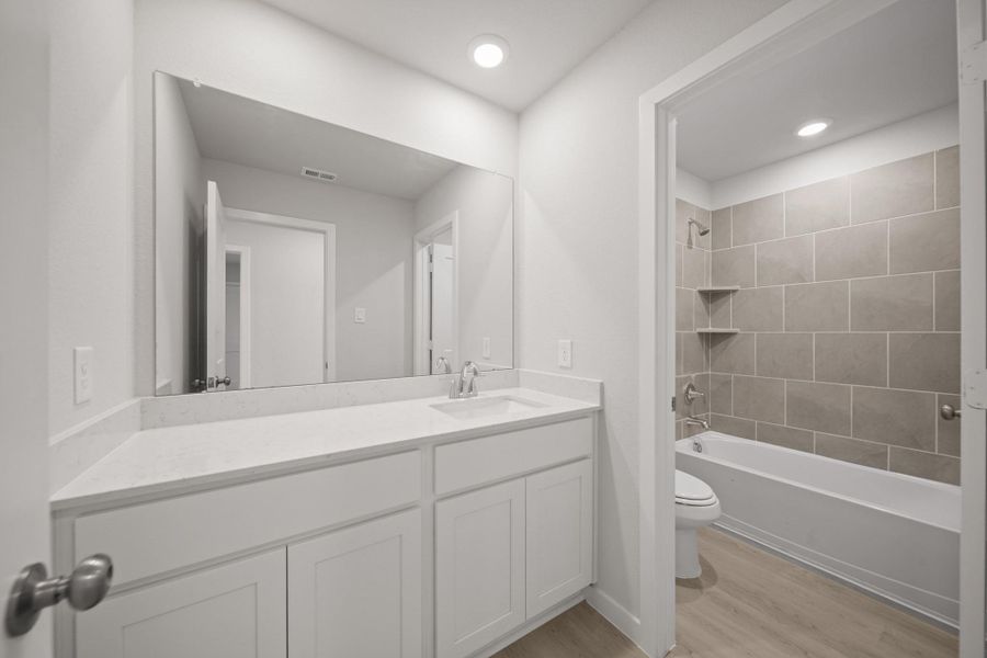 Furnished interior view inside a new home in Willow Trace 45' at Willow Trace, Spring (Image 12).