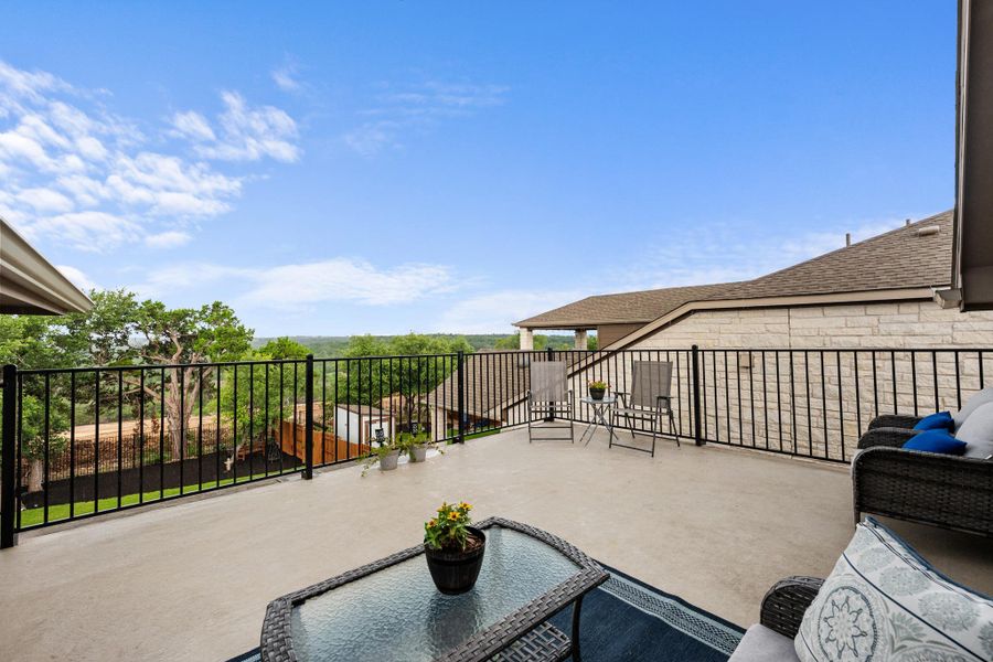 Enjoy endless outdoor living and tree-filled scenery from this expansive upper-level patio. Enjoy endless outdoor living and tree-filled scenery from this expansive upper-level patio.