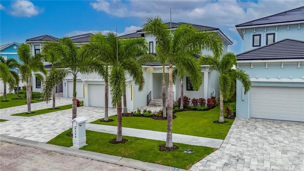 Front exterior of a new home in , Apollo Beach, FL, highlighting curb appeal (Image 29).