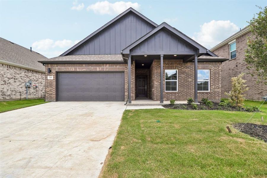 Front exterior of a new home in Overland Grove, Forney, TX, highlighting curb appeal (Image 18).