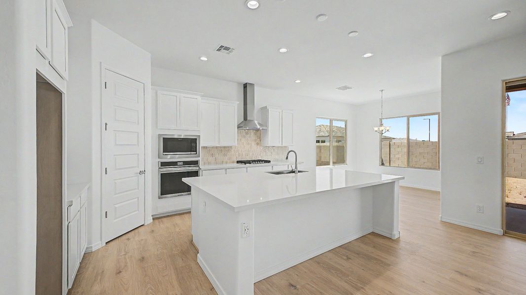 Furnished interior view inside a new home in Windrose, Waddell (Image 5).