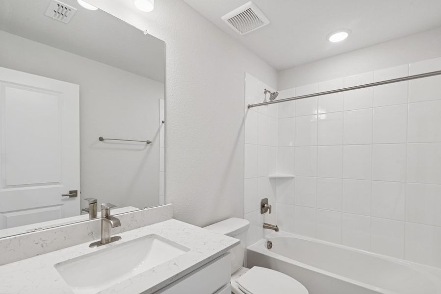 Furnished interior view inside a new home in Beacon Point at Lago Mar 50’ Homesites, Texas City (Image 13).