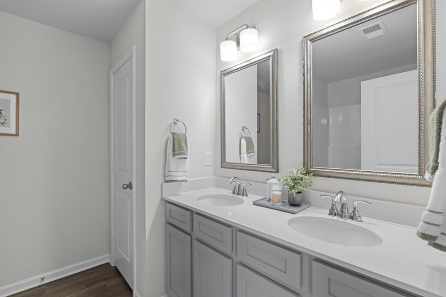 Representative furnished interior of a home built from the Walnut by McGuinn Homes in Sibley Village Townhomes, Sumter (Image 17).
