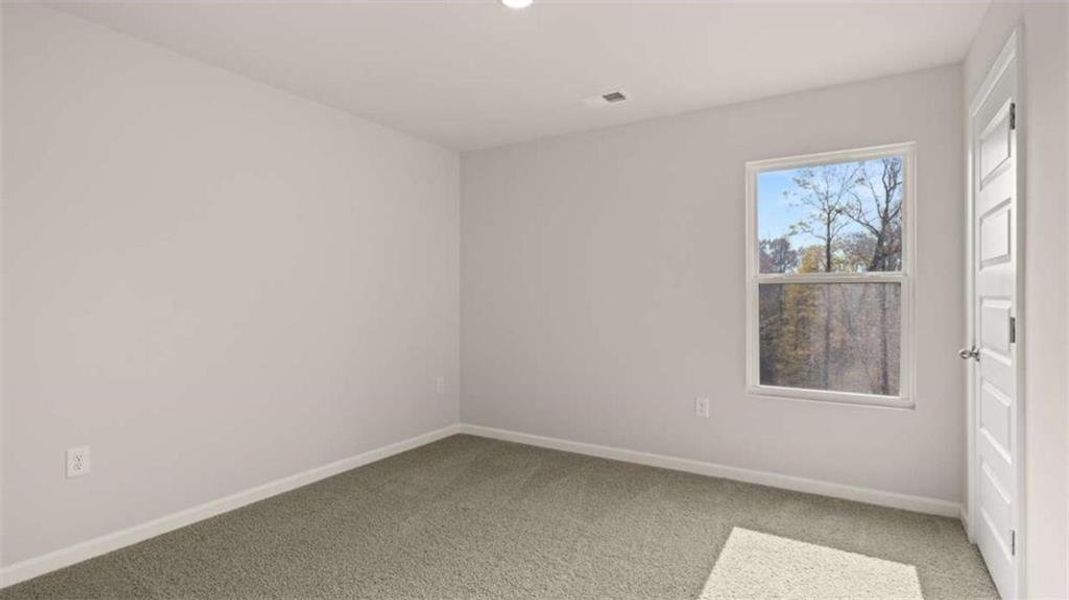 Spacious, unfurnished interior of a new home in The Reserve at Calcutta, Stockbridge (Image 14).