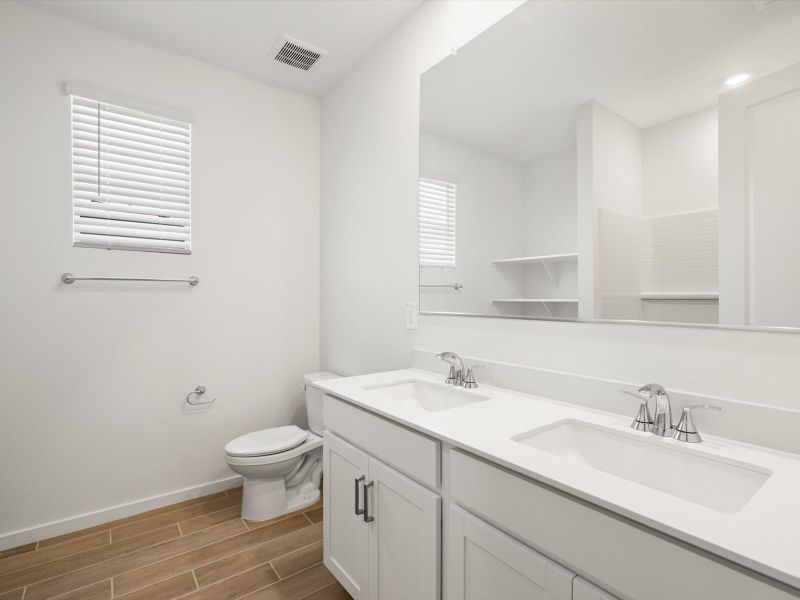 Furnished interior view inside a new home in White Tank Foothills Signature Series, Waddell (Image 4).