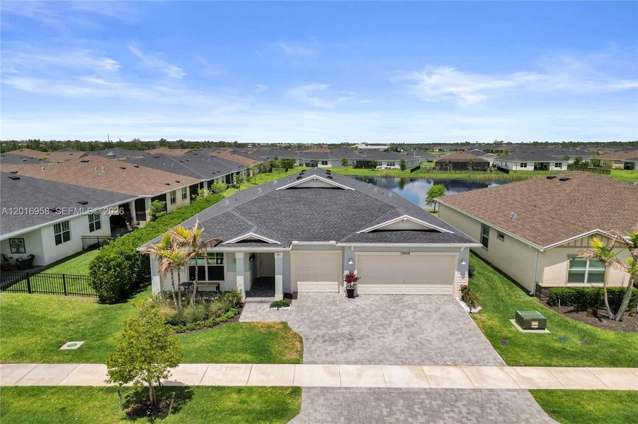 Front exterior of a new home in , Port St. Lucie, FL, highlighting curb appeal (Image 25). Front exterior of a new home in , Port St. Lucie, FL, highlighting curb appeal (Image 25).