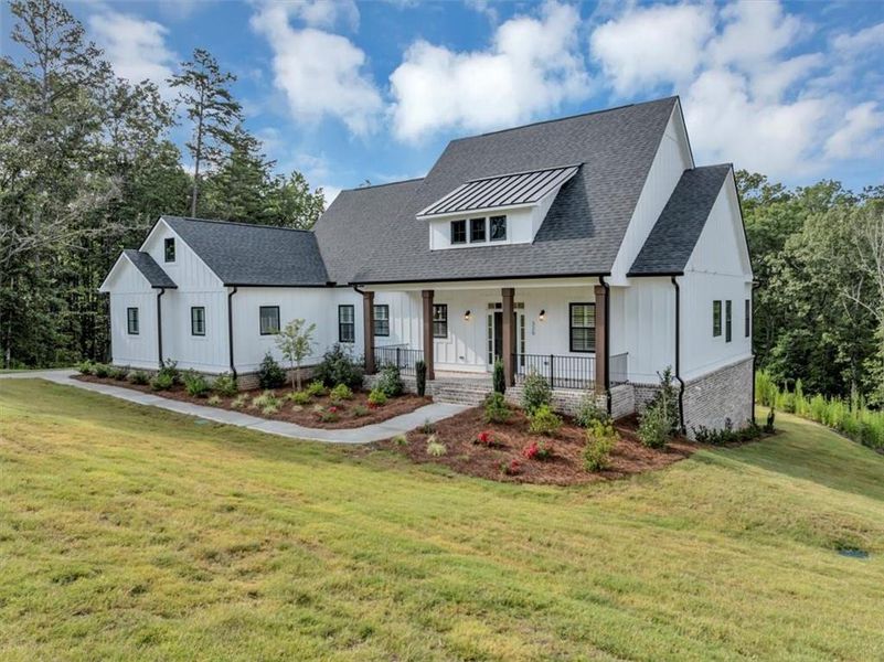 Front exterior of a new home in , Ball Ground, GA, highlighting curb appeal (Image 23).