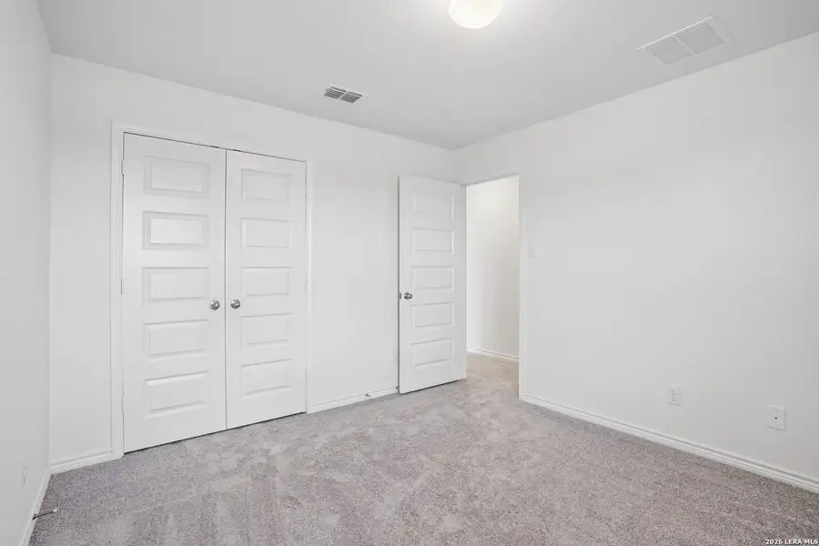 Spacious, unfurnished interior of a new home in Medina Crossing, Von Ormy (Image 33).
