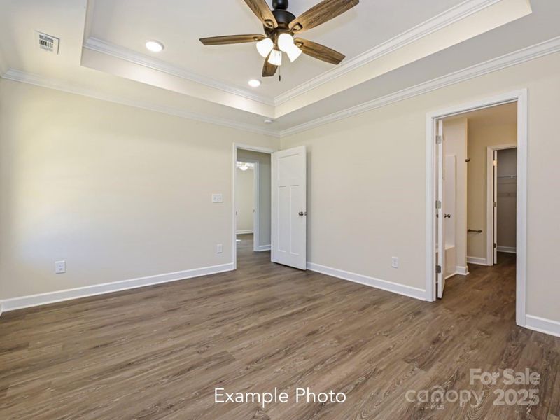 Example Photo Example Photo